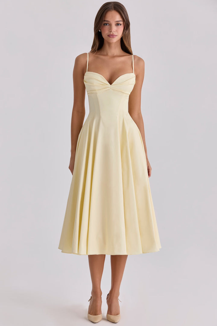Elegant yellow gathered bust midi dress for women, ideal for effortless summer and vacation style.