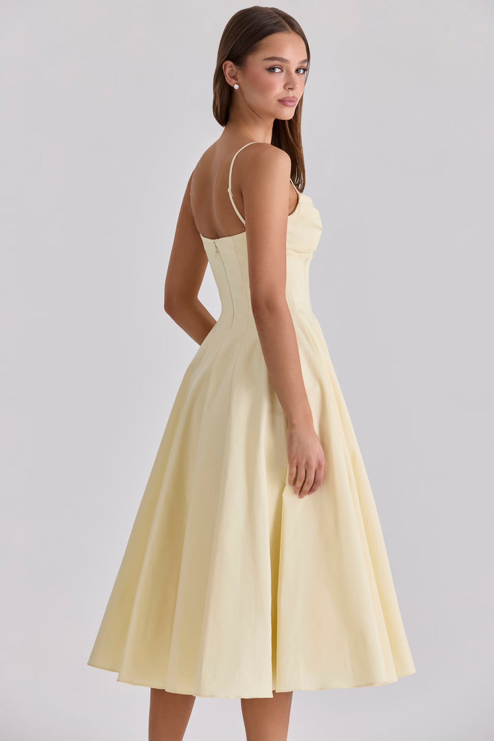 Comfortable women's yellow midi dress with gathered bust, perfect for casual summer fashion and everyday wear.