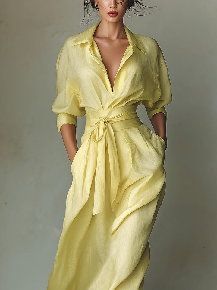 Women's yellow button-front maxi shirt dress with an elegant tie-waist & half sleeves. Perfect casual summer day dress.