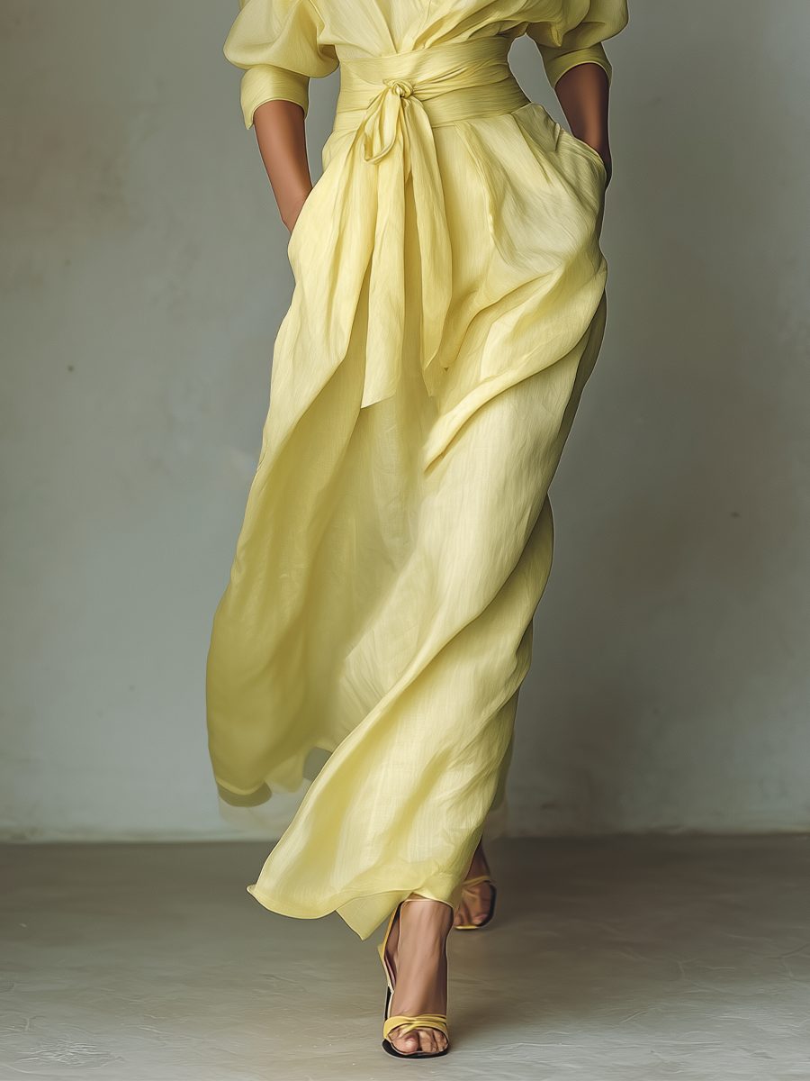 Elegant women's yellow tie-waist maxi shirt dress with half sleeves. A versatile, flowy casual summer day dress.