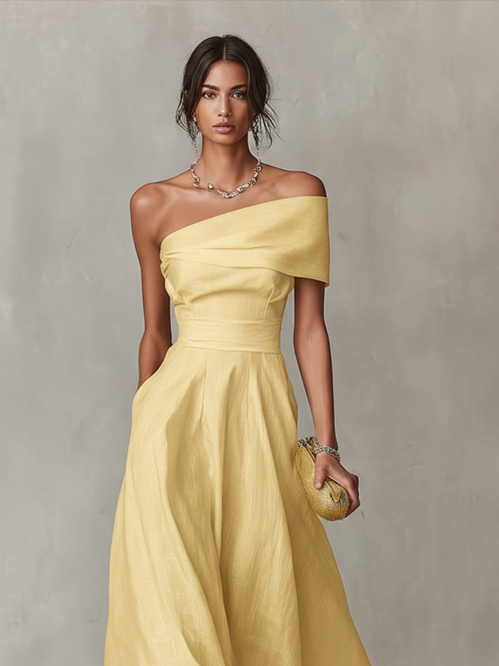 Stylish women's one-shoulder yellow midi dress with a flattering fit, perfect for upscale parties and fashion events.