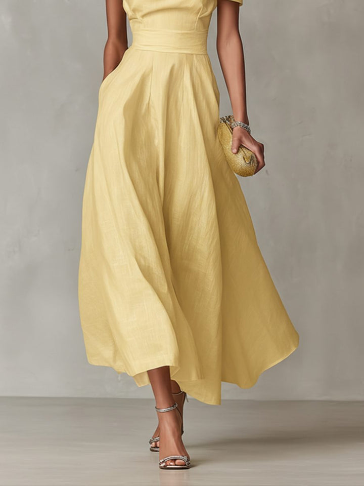 Beautiful yellow one-shoulder party dress for women, a chic and elegant midi length outfit for special occasions.