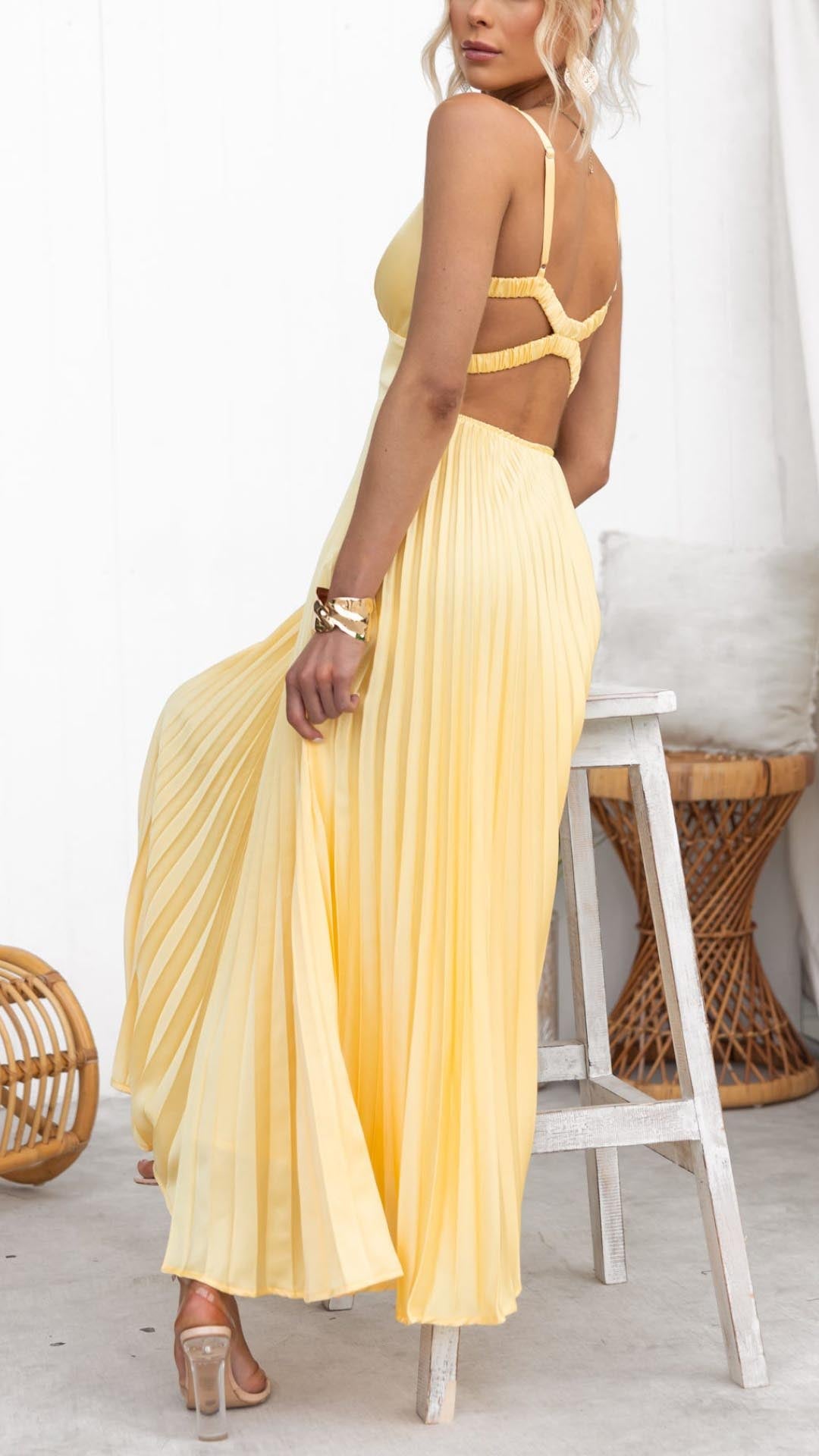 Chic women's pleated V-neck maxi dress in yellow, ideal for wedding guests, formal events, or elegant summer parties.