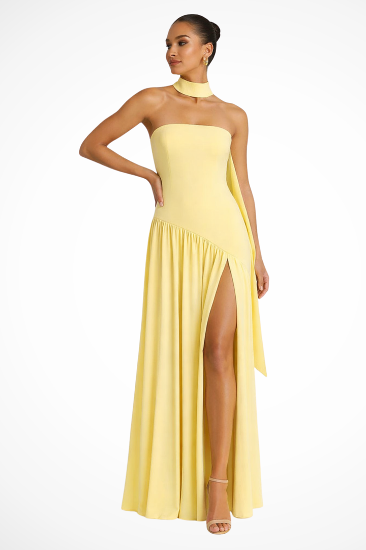 Women's brown strapless maxi dress, elegant and floor-length with a stylish side slit. Ideal for formal parties.