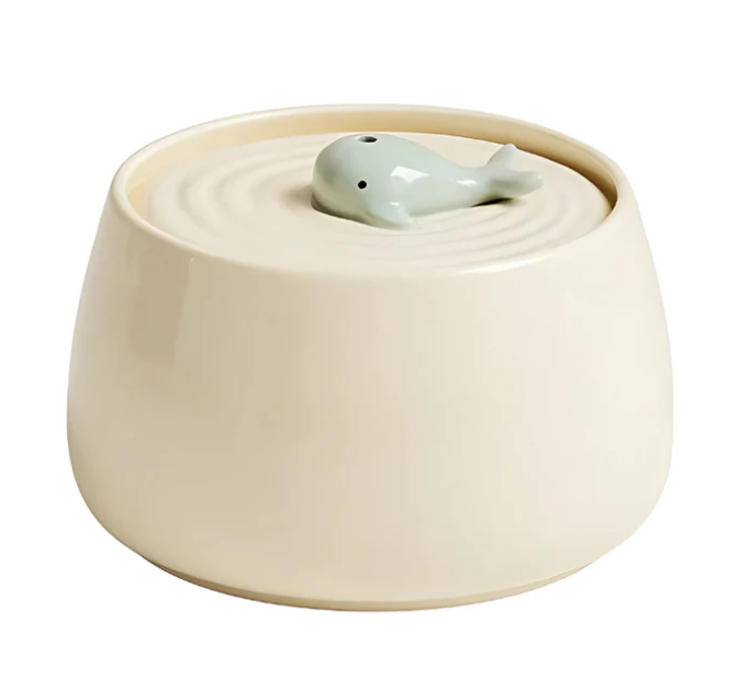 Ceramic pet food & water bowls in an elevated wooden feeder, ideal for comfortable pet dining.
