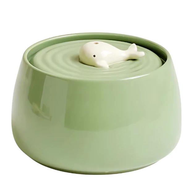 Stylish elevated ceramic dog bowls with a sturdy wood stand, reducing neck strain for pets.