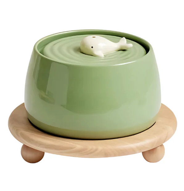 Pet feeding station: two white ceramic bowls in a sleek wooden elevated stand, non-slip base.