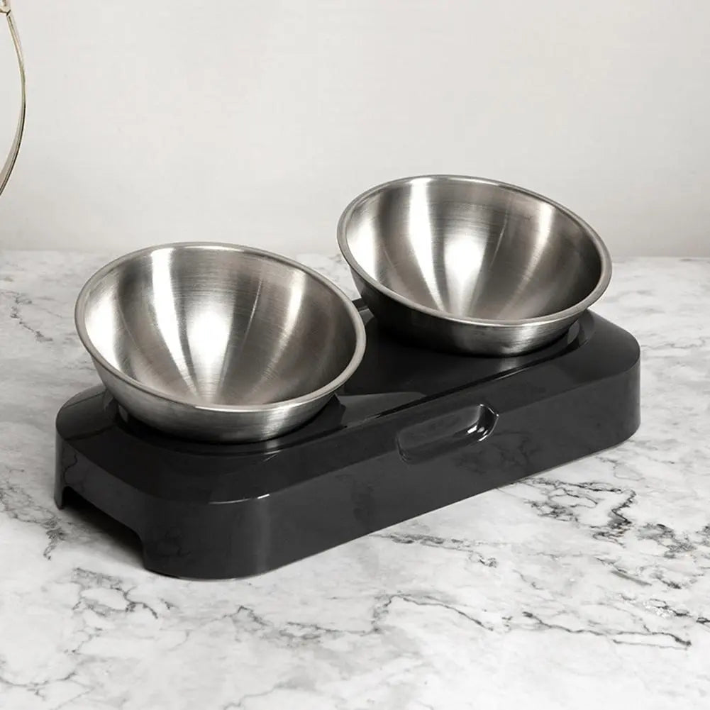 Stylish elevated pet feeder with two stainless steel bowls, promoting healthier posture for cats.