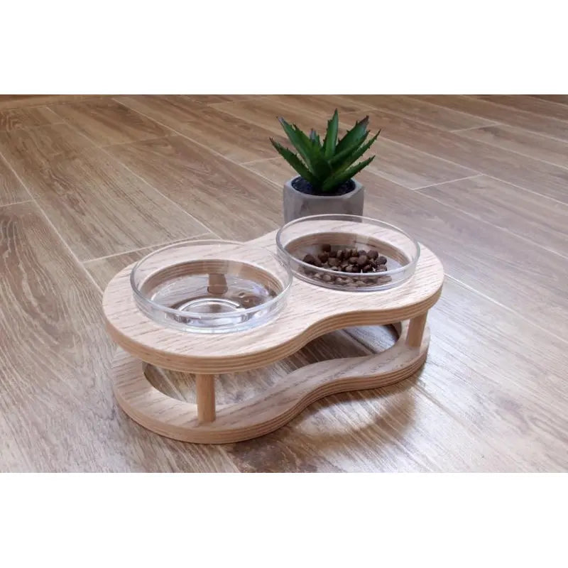 Comfortable pet supplies: raised wood and glass dog & cat bowl set with a sturdy non-slip platform.
