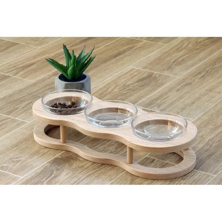 Durable wood & glass elevated feeder for pets, featuring two bowls and a non-slip base for secure mealtimes.