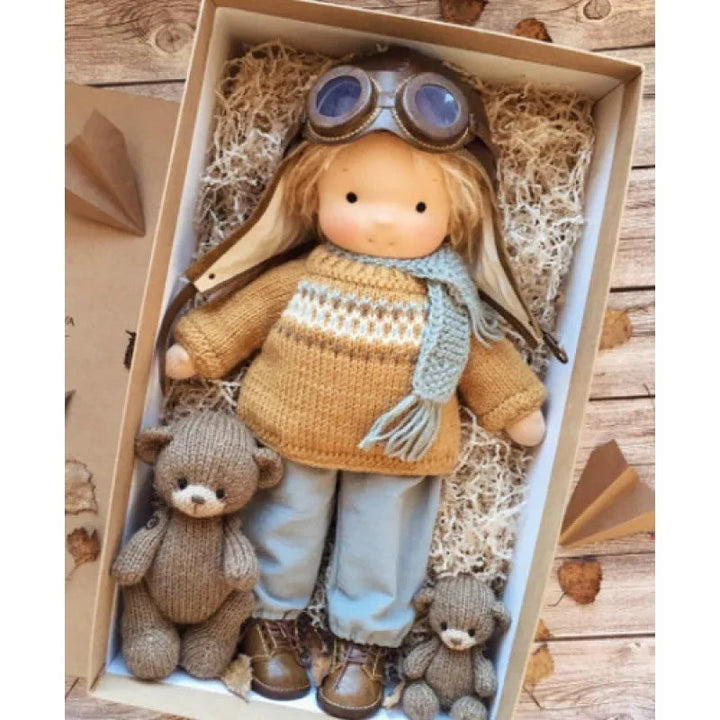 Elise plush doll arranged with other Waldorf-inspired toys.