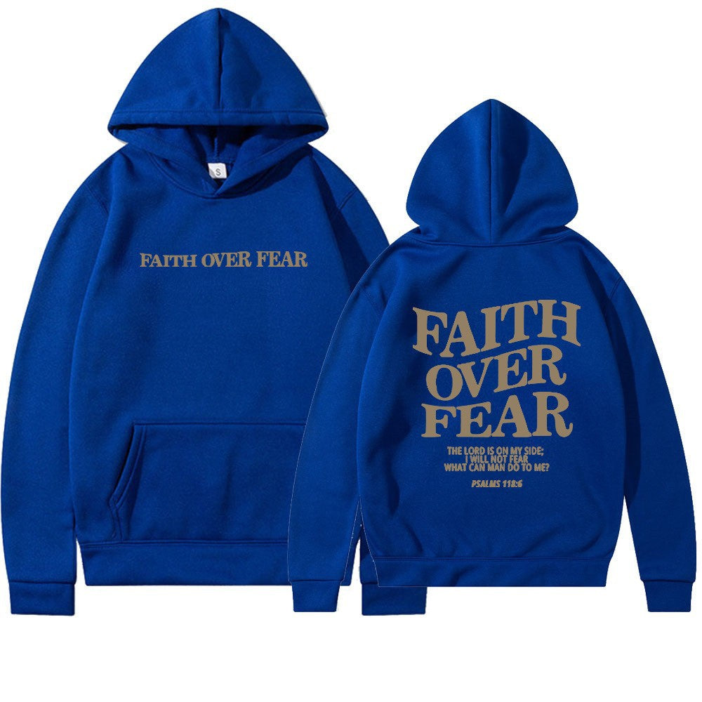 Women's Faith Over Fear graphic hoodie paired with jeans. Stylish & empowering casual streetwear look.