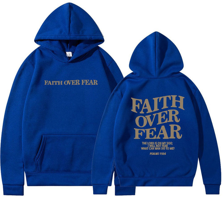 Women's Faith Over Fear graphic hoodie paired with jeans. Stylish & empowering casual streetwear look.