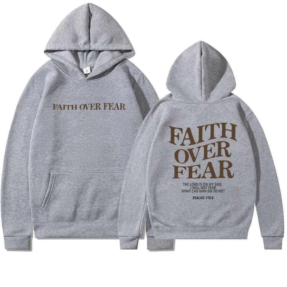 Full-length view of Women's Faith Over Fear graphic hoodie, a comfortable & empowering streetwear pullover.