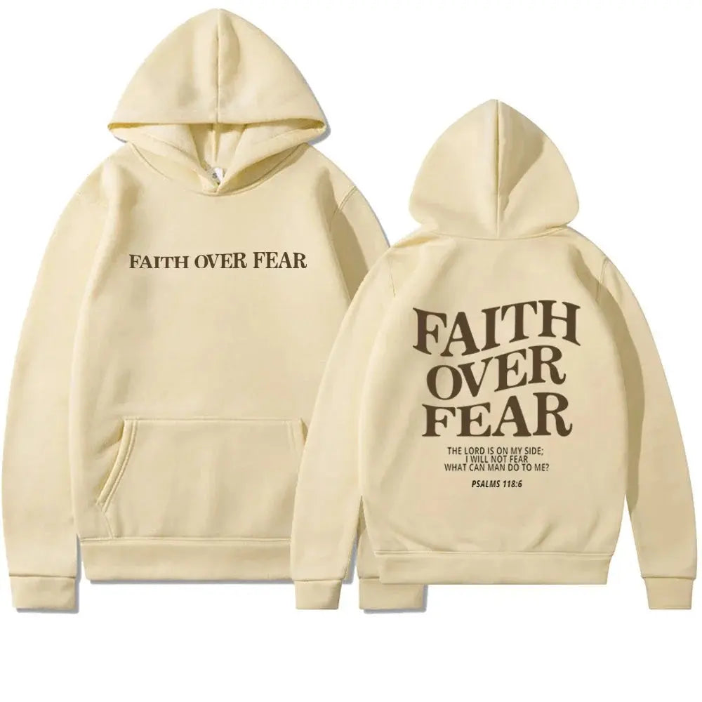 Woman in stylish Women's Faith Over Fear graphic hoodie. Perfect for everyday casual wear & streetwear style.
