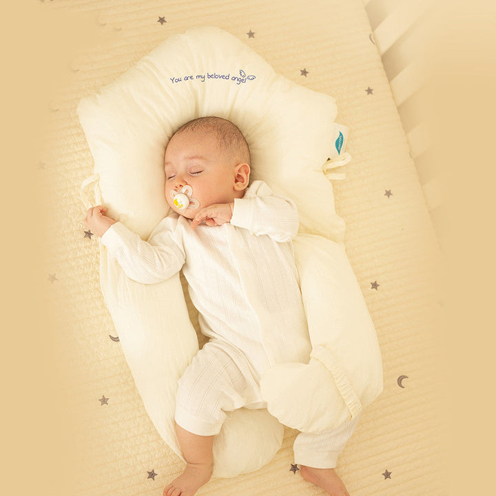 Safe baby sleep pillow with antibacterial fabric and ergonomic design for ultimate comfort.