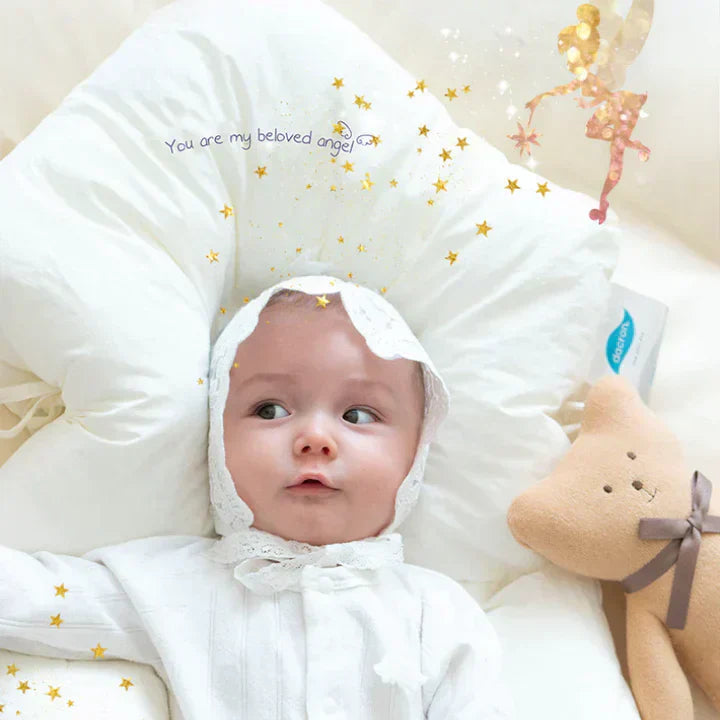 Antibacterial cuddle cushion for babies, promoting safe and ergonomic sleep positions.