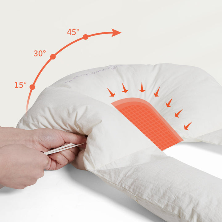 Travel-friendly ergonomic baby sleep cushion with antibacterial and safe cuddle features.