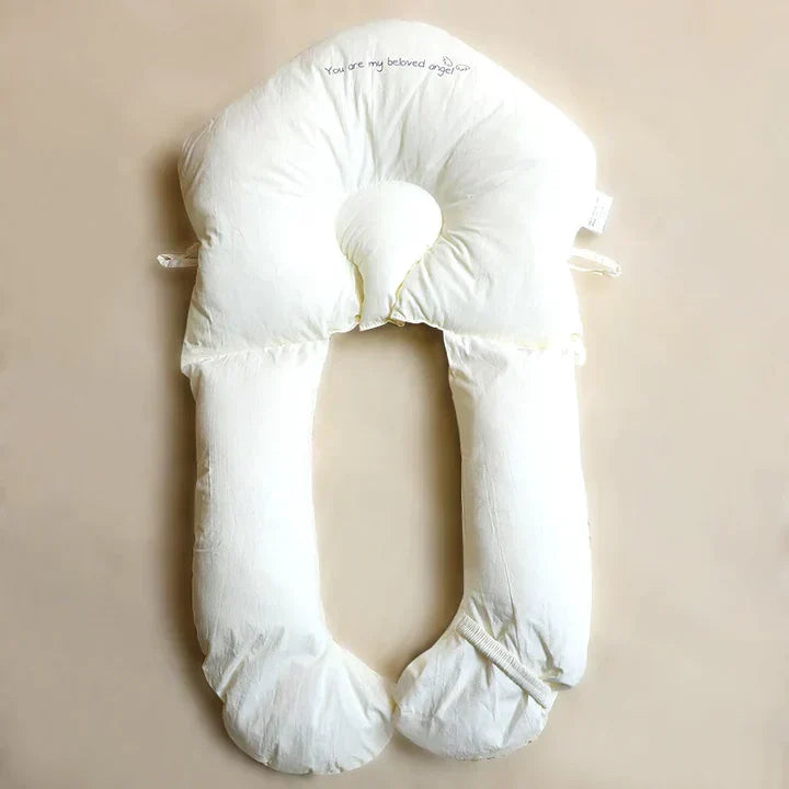 Secure and comfortable baby sleep with this antibacterial ergonomic cuddle cushion.