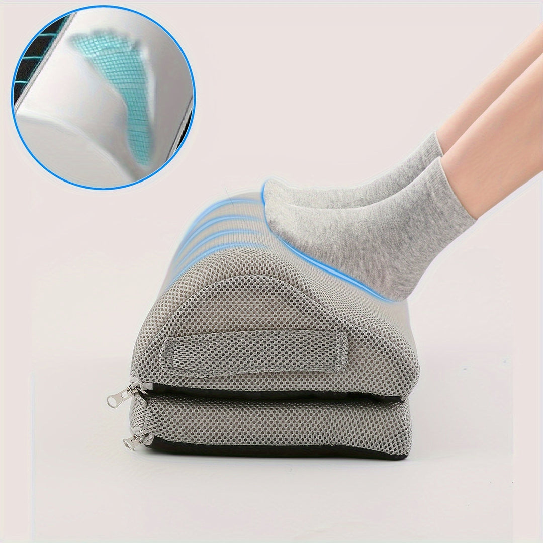 Ergonomic memory foam footrest in gray for comfortable office seating