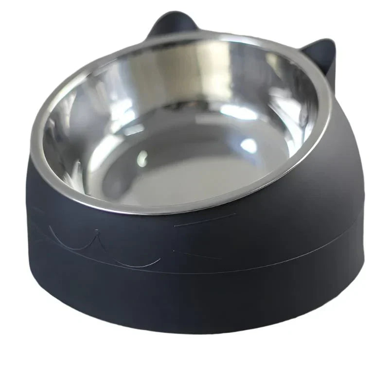 Set of three raised cat food bowls in blue, green, and pink.