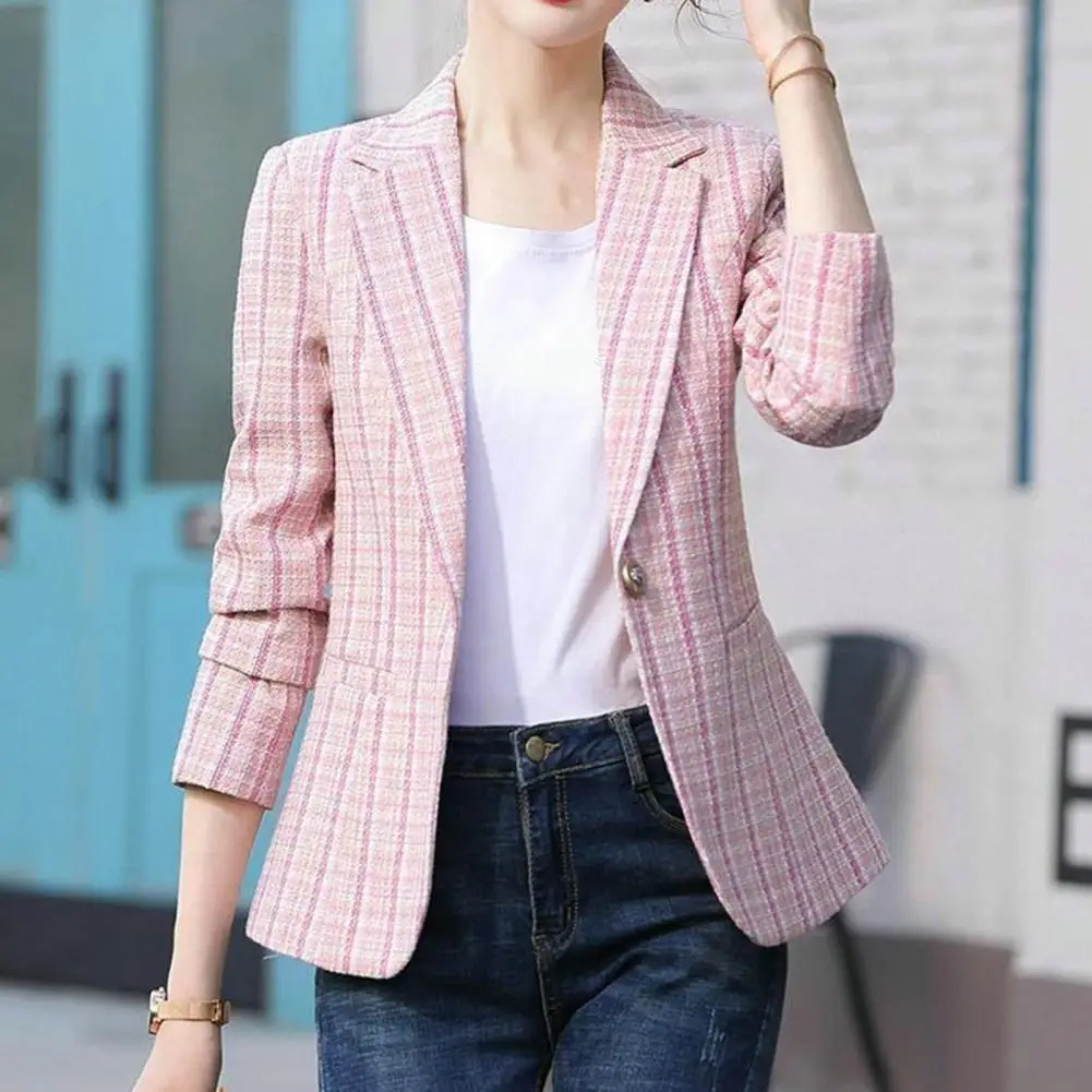 Woman wearing Esme single-button tailored blazer, ideal for professional office wear and smart casual business looks.