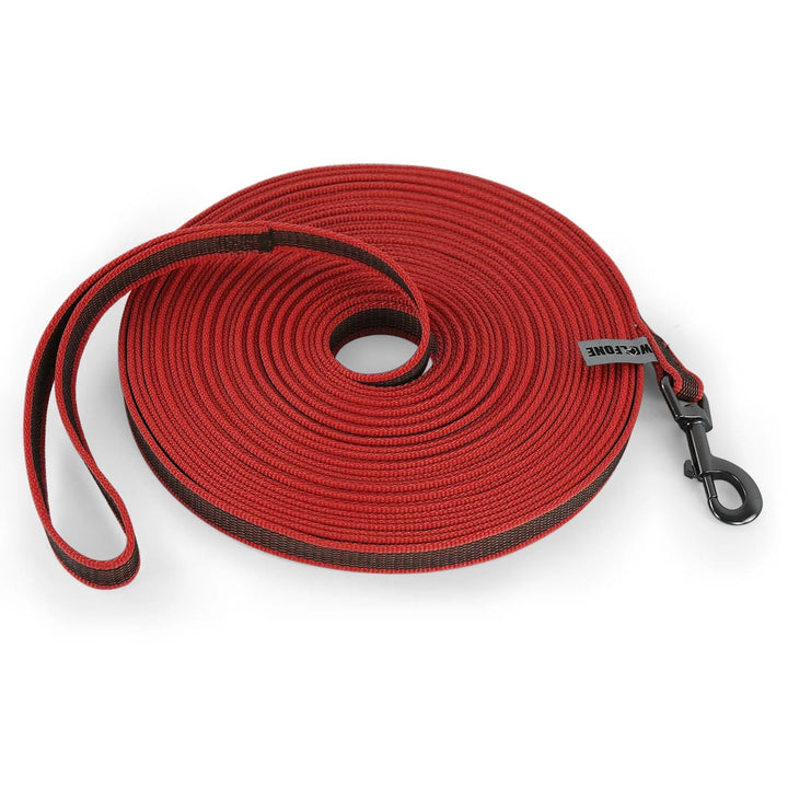 High-visibility extra long waterproof dog lead, ensuring safety during outdoor dog training.