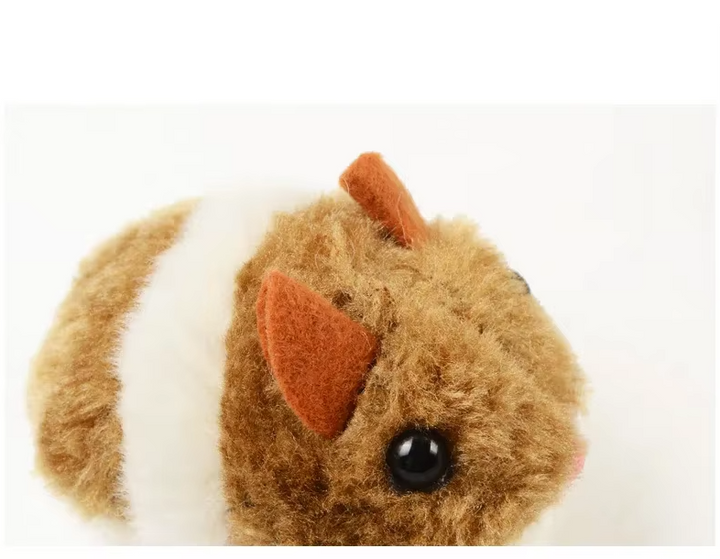 Feline enrichment electric toy: a plush hamster providing automatic fun for cats.