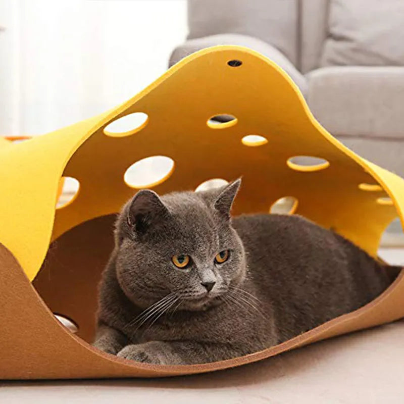 Engaging cat accessory: a felt play tunnel with holes, ideal for feline exercise & playtime.