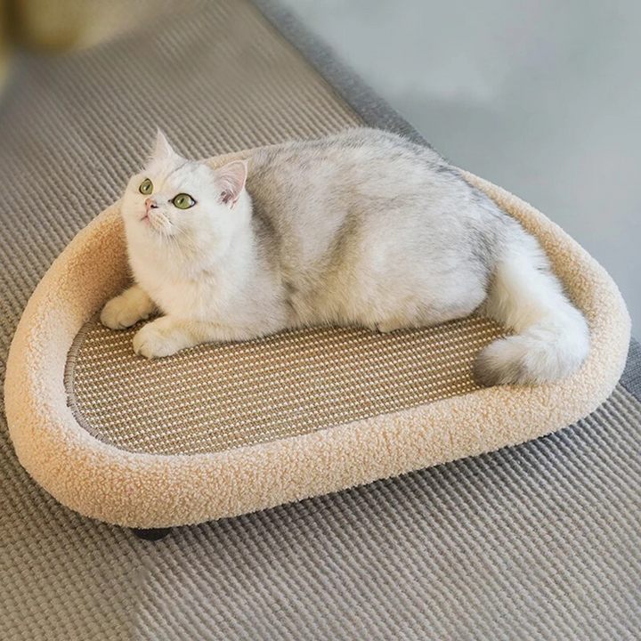 FelineArc curved cat scratching pad lounger, a durable pet furniture and cozy cat bed.