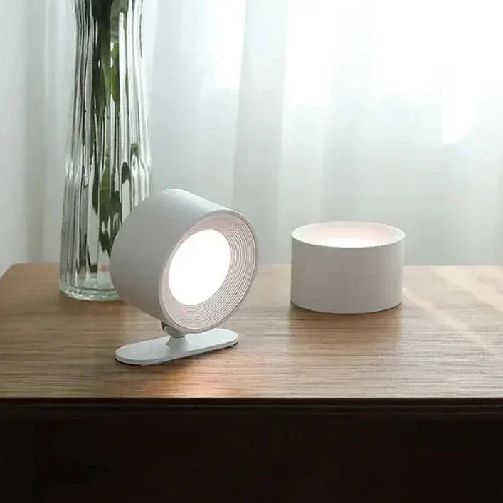 User adjusting brightness of FlexiGlow rotatable light via remote control.