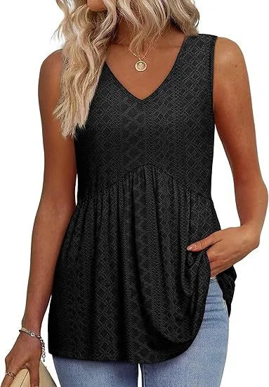 Floral print V-neck sleeveless peplum tank top for women. Elegant spring/summer floral blouse.