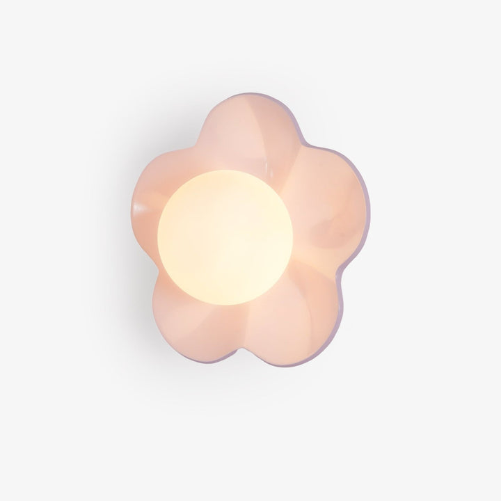 Floral resin & glass wall or ceiling light for modern indoor decor.