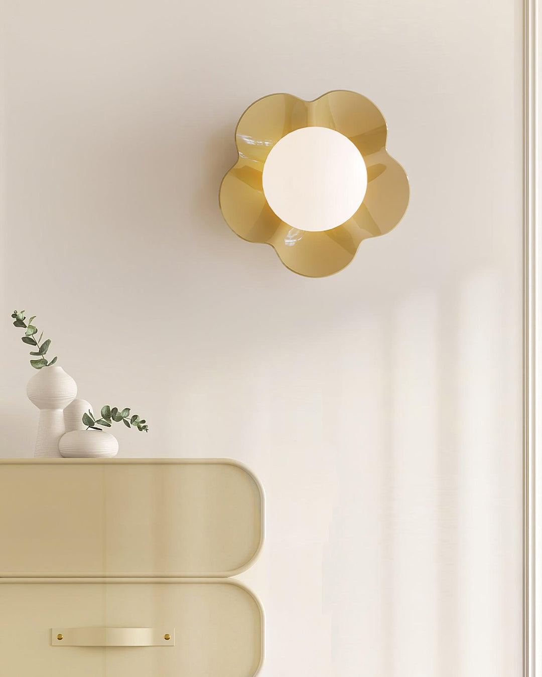 Unique floral resin wall lamp, glass shade, for indoor illumination.