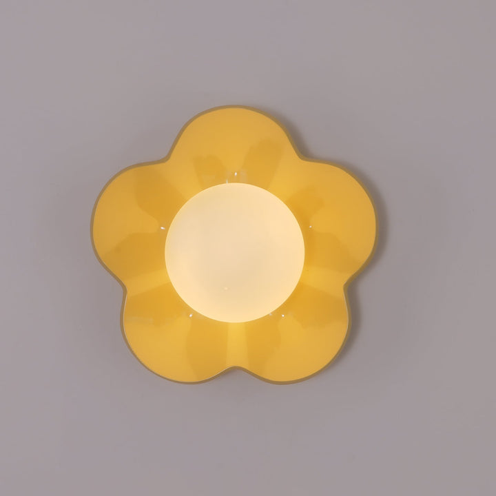 Stunning floral resin & glass wall light for ambient home decor.