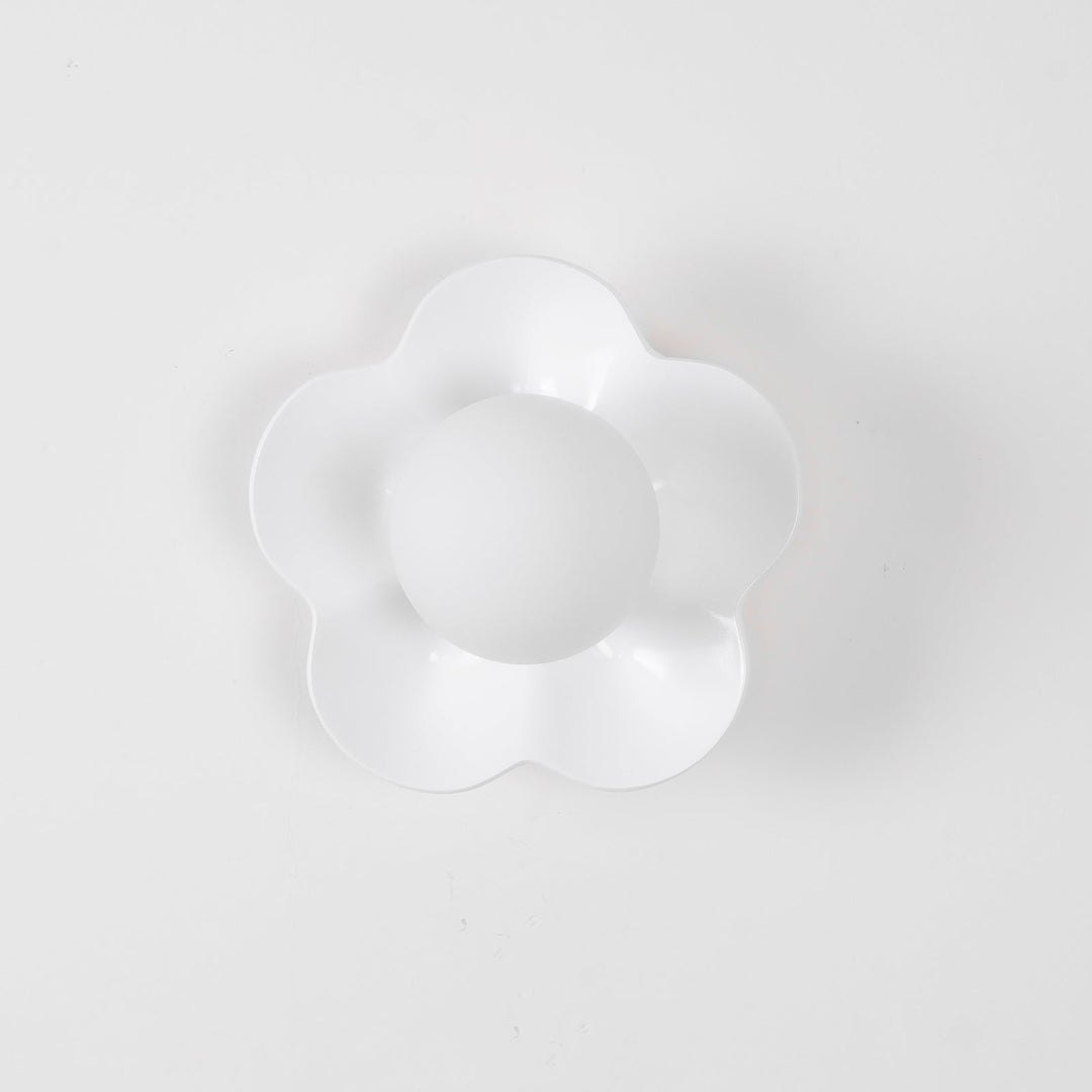 Modern floral ceiling light, resin body & glass shade, accent decor.