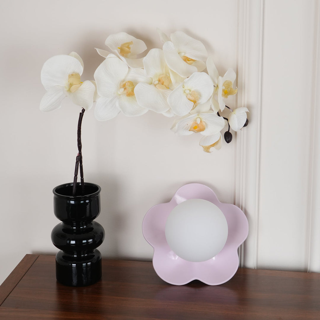 Handcrafted look floral resin & glass indoor light fixture.