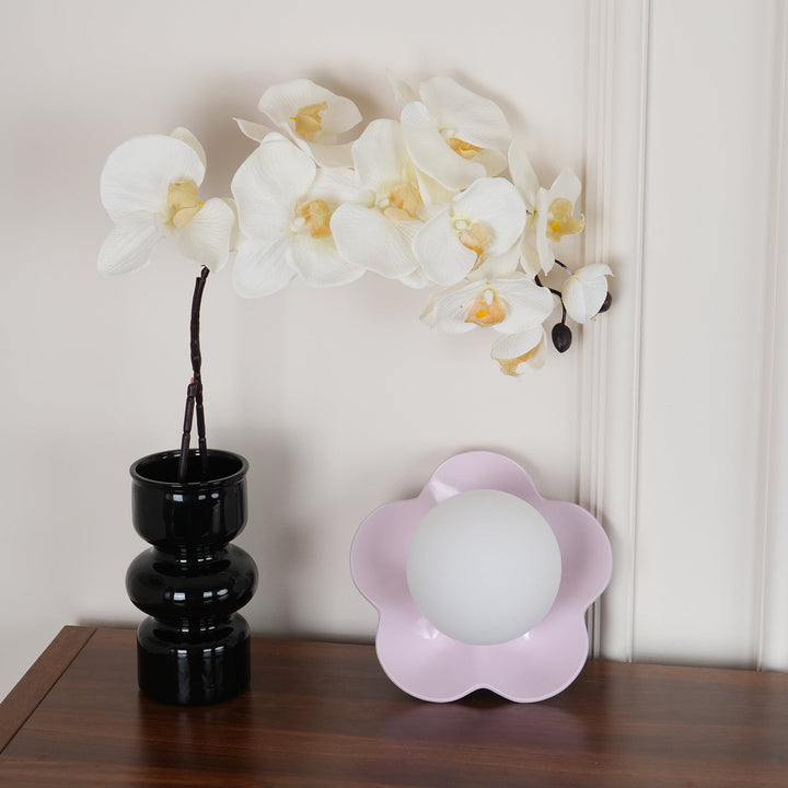 Handcrafted look floral resin & glass indoor light fixture.