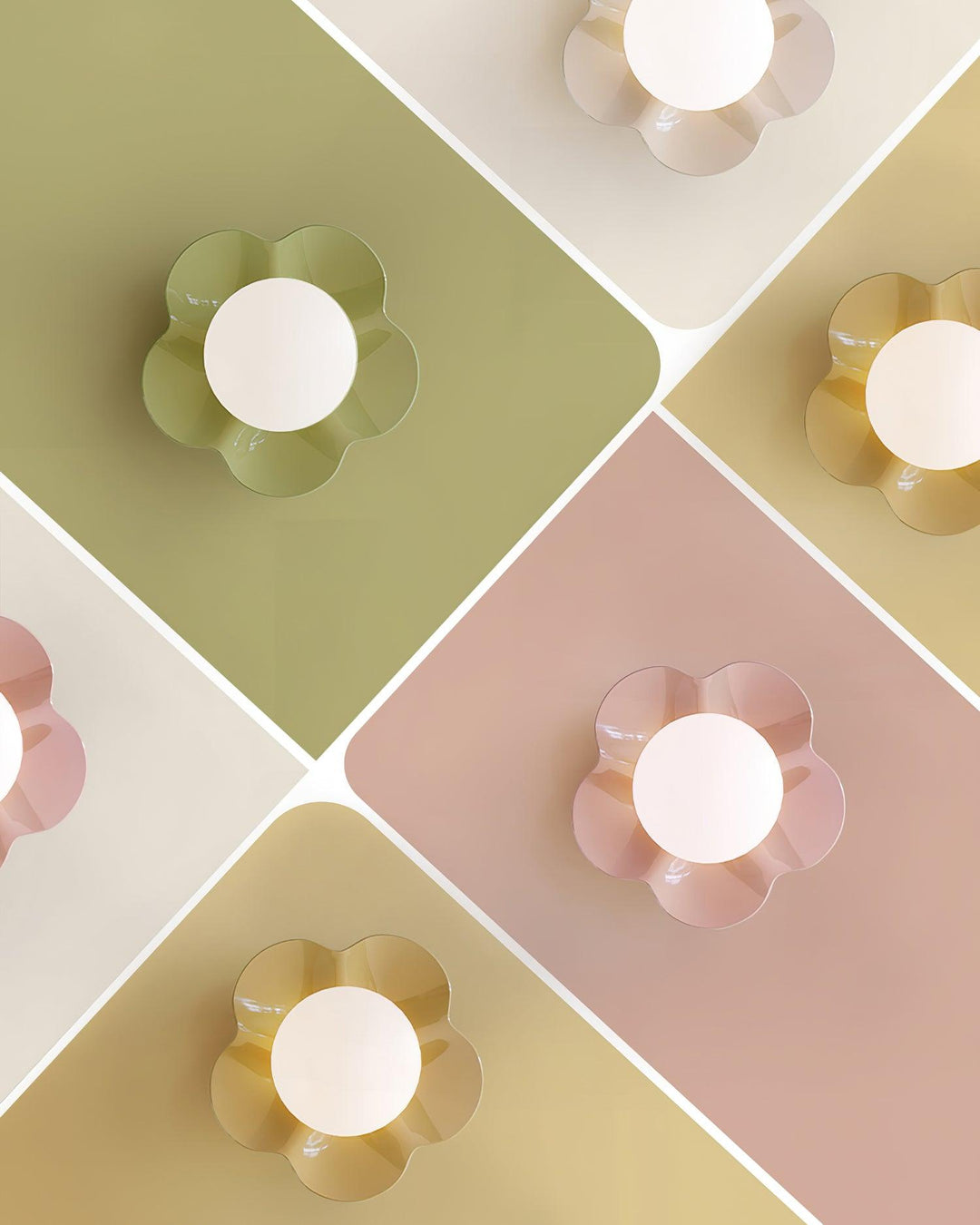 Transparent glass shade on a floral resin decorative wall lamp.