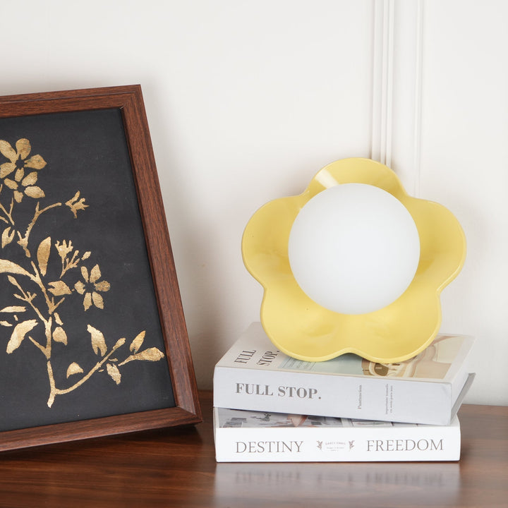Versatile floral resin & glass light, mounts on wall or ceiling.