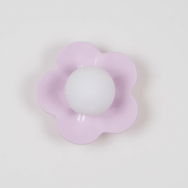 Unique floral design resin & glass wall light, great for home lighting.