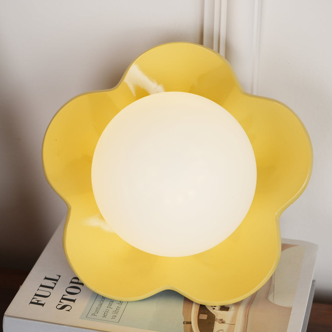 Durable resin & elegant glass floral light for modern homes.