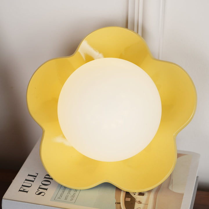 Durable resin & elegant glass floral light for modern homes.