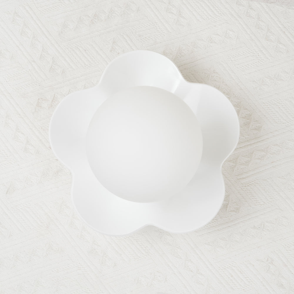 Delicate floral resin and glass shade indoor lighting fixture.