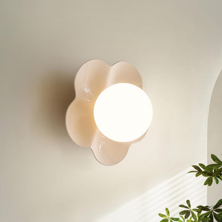 Bright floral resin & glass ceiling light, ideal for modern spaces.