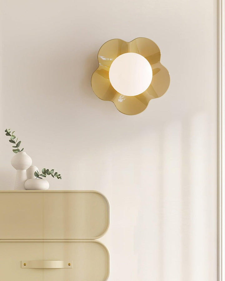 Functional yet decorative floral resin wall/ceiling light with glass.
