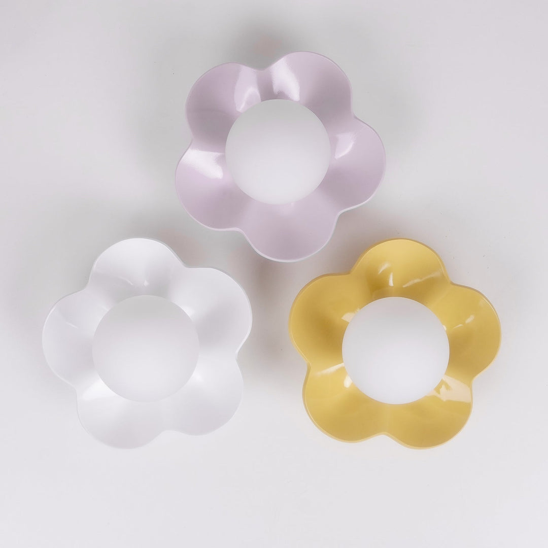 Home lighting: Floral resin and glass wall/ceiling lamp.