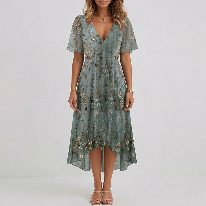 Women's elegant floral wrap midi dress, tiered hem, flattering design for wedding guests.