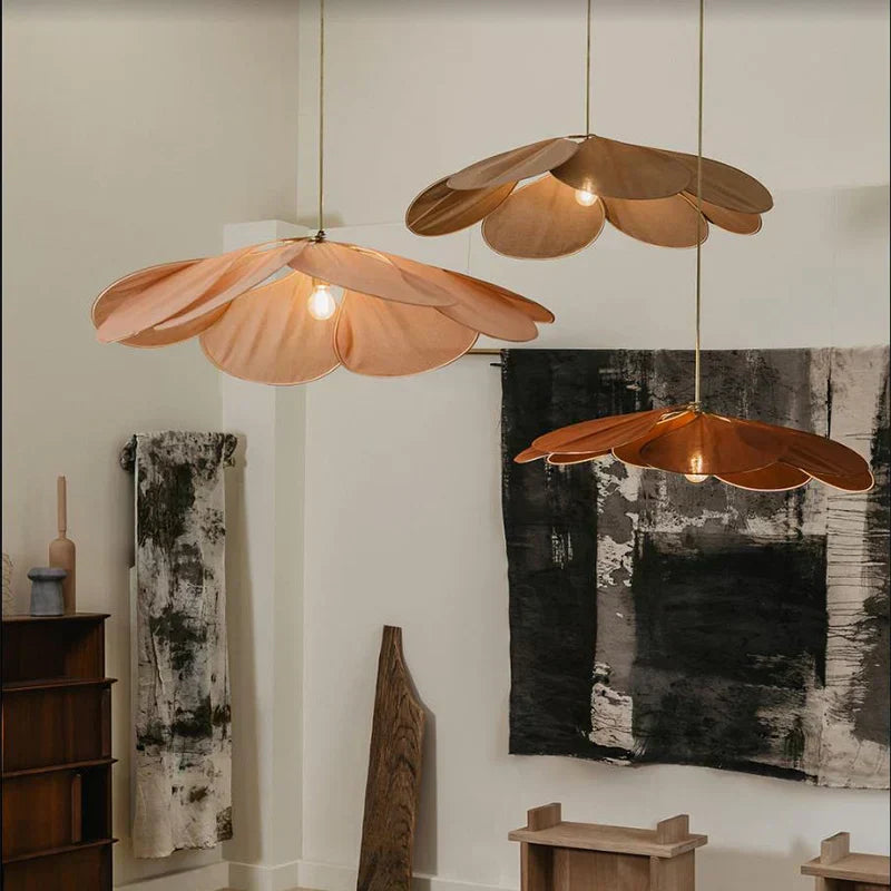 Fabric flower pendant light, providing a soft glow for living rooms or bedrooms. Natural decor.