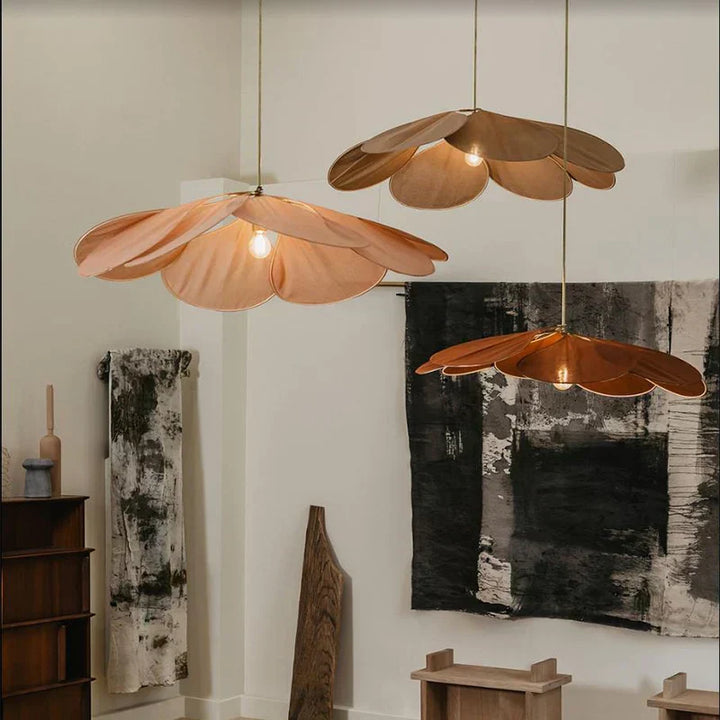 Fabric flower pendant light, providing a soft glow for living rooms or bedrooms. Natural decor.